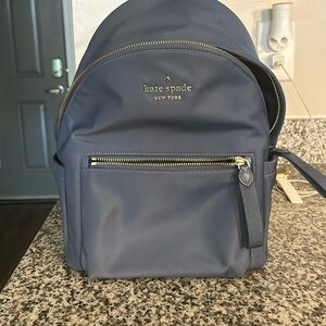 Kate spade book bag type purse, slightly used.